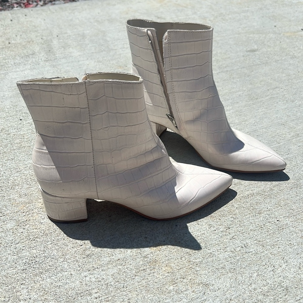 Creamy white heeled booties
